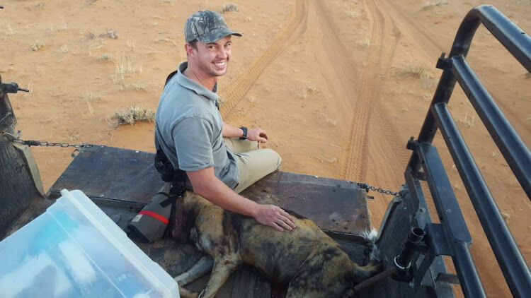 Cole du Plessis with wild dogs